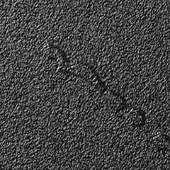 comp_crack_1 Asphalt surface with a synthetic dent defect.